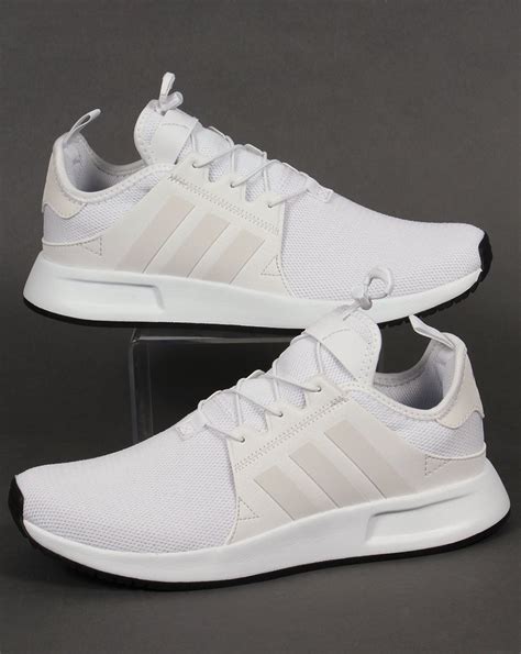 adidas originals triple white trainers.